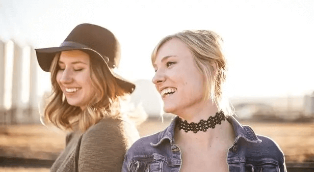 two women smiling